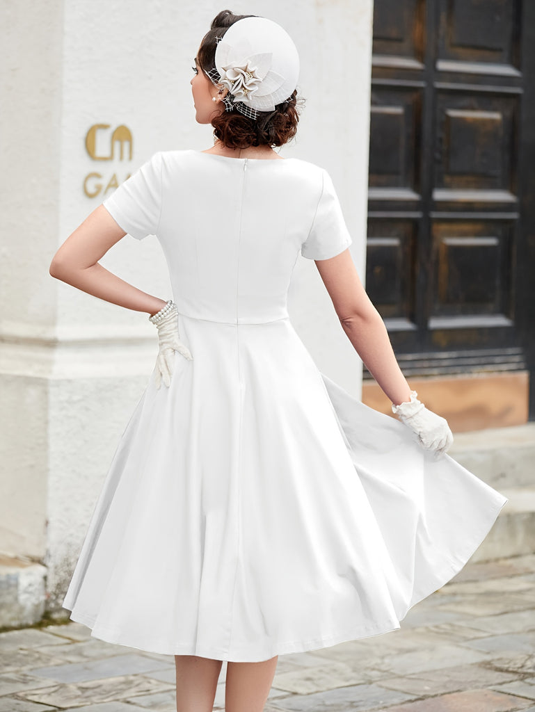 Vintage Elegance & Charm: Crew Neck Bow-Front Flared A-line Midi Dress by MUXXN for Spring/Summer