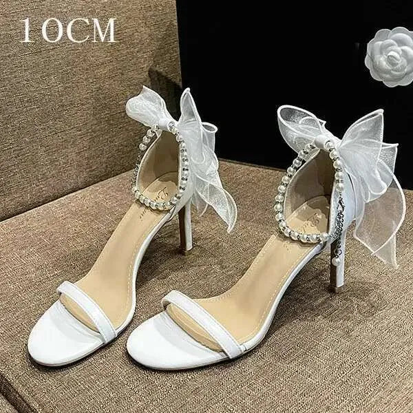Summer New Round Head Sandals Pearl One Line Buckle White Bow High Heels Fairy Wind Female Wedding Shoes Kq8