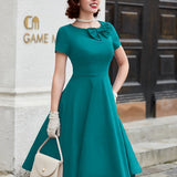 Vintage Elegance & Charm: Crew Neck Bow-Front Flared A-line Midi Dress by MUXXN for Spring/Summer
