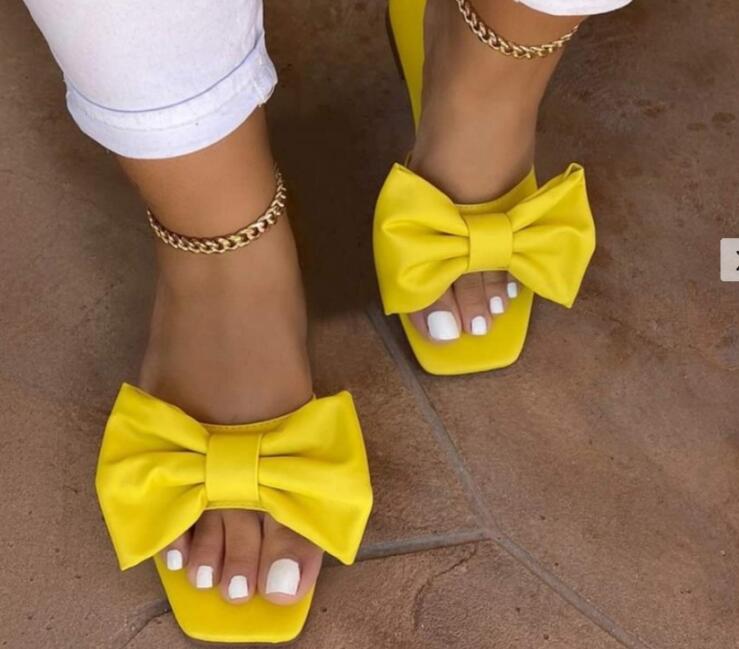 woloong  Spring/summer new outdoor flat leather bow non-slip beach lady slippers casual all-match fashion women sandals