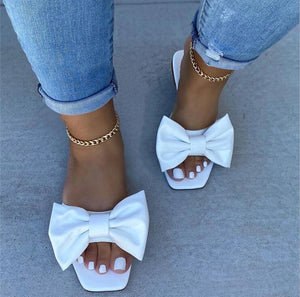 woloong  Spring/summer new outdoor flat leather bow non-slip beach lady slippers casual all-match fashion women sandals