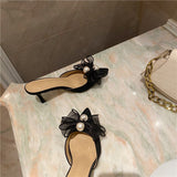 woloong New Baotou Half Drag Thin Heel Bow Sandals Pointed Pearl High Heel Muller Shoes