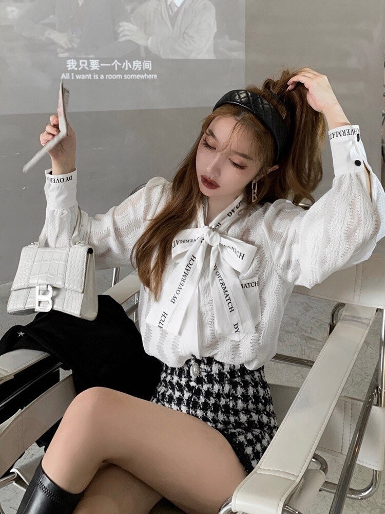 woloong French style restoring ancient ways ribbon bow blouse female temperament of early spring new white shirt long sleeve lace tops
