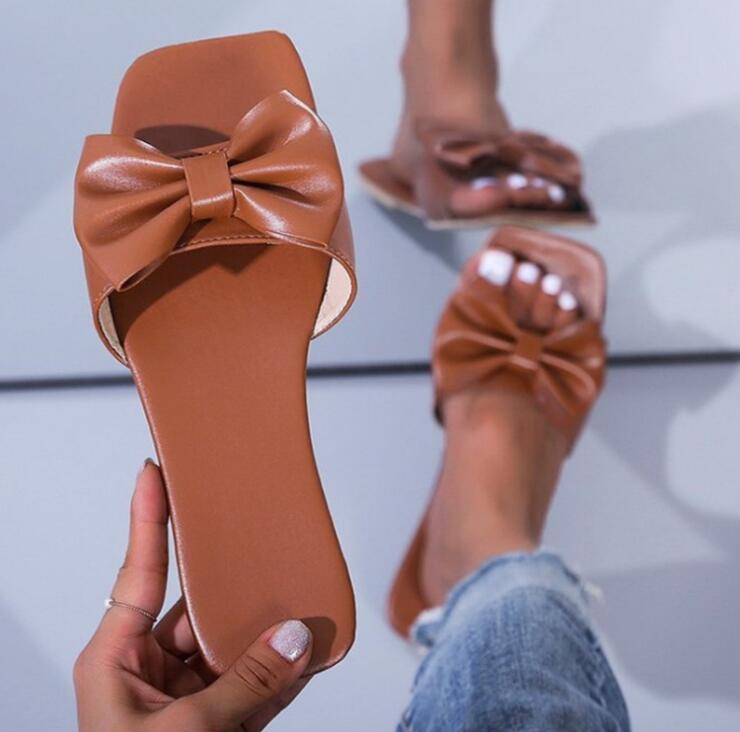 woloong  Spring/summer new outdoor flat leather bow non-slip beach lady slippers casual all-match fashion women sandals