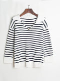 2025 Now Yang Zi Shen Meng has the same black and white striped lazy knitted sweater autumn and winter sweater V-neck pullover loose lapel top.