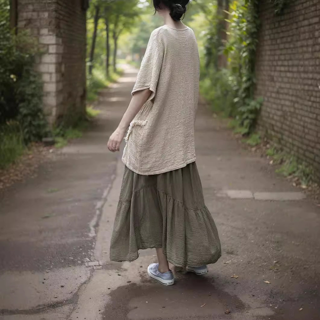 Shan Qian Nianyi, irregular and elegant medium and long skirt in summer, literary combed cotton single crepe refreshing lace-up skirt