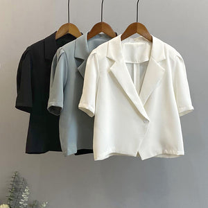 2025 summer short-sleeved suit retro pure bubble sleeve women's single-grain buckle loose Korean casual suit jacket 2140