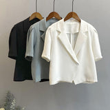 2025 summer short-sleeved suit retro pure bubble sleeve women's single-grain buckle loose Korean casual suit jacket 2140