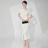 2025 Guofeng women's clothing high-end suit, retro button-up new Chinese T-shirt, short-sleeved hip-wrapped skirt, pleated two-piece set