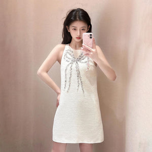 Xiaoxiangfeng's new heavy industry three-dimensional bead design sense, round neck sleeveless temperament, waist and thin dress N1016