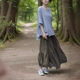 Shan Qian Nianyi, irregular and elegant medium and long skirt in summer, literary combed cotton single crepe refreshing lace-up skirt