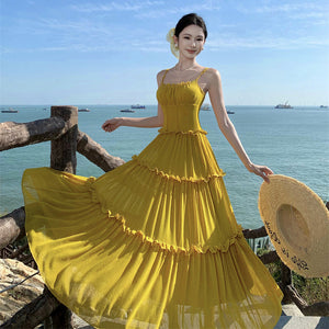 2025 Sanya travel wear seaside vacation beach dress beautiful and unique yellow lace suspender dress temperament long dress