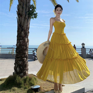2025 Sanya travel wear seaside vacation beach dress beautiful and unique yellow lace suspender dress temperament long dress