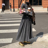 2025 In stock, this year's popular high-end suit, slim-fit solid-color long-sleeved T-shirt, bottoming shirt, pleated long skirt, two-piece set.