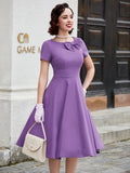 Vintage Elegance & Charm: Crew Neck Bow-Front Flared A-line Midi Dress by MUXXN for Spring/Summer