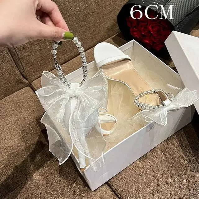 Summer New Round Head Sandals Pearl One Line Buckle White Bow High Heels Fairy Wind Female Wedding Shoes Kq8