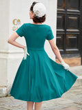 Vintage Elegance & Charm: Crew Neck Bow-Front Flared A-line Midi Dress by MUXXN for Spring/Summer