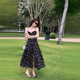 2025 summer new black floral dress women's high-end temperament coffee break skirt split suspender skirt long dress