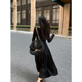 2025 Hollow knitted long-sleeved dress women's  spring new design sense niche temperament slim and thin long dress